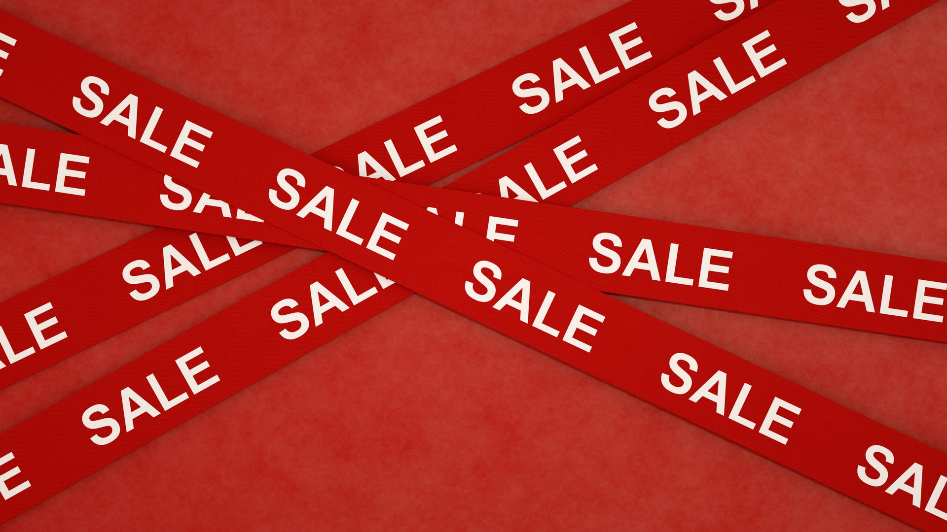 Sale Tape Barrier on Red Background